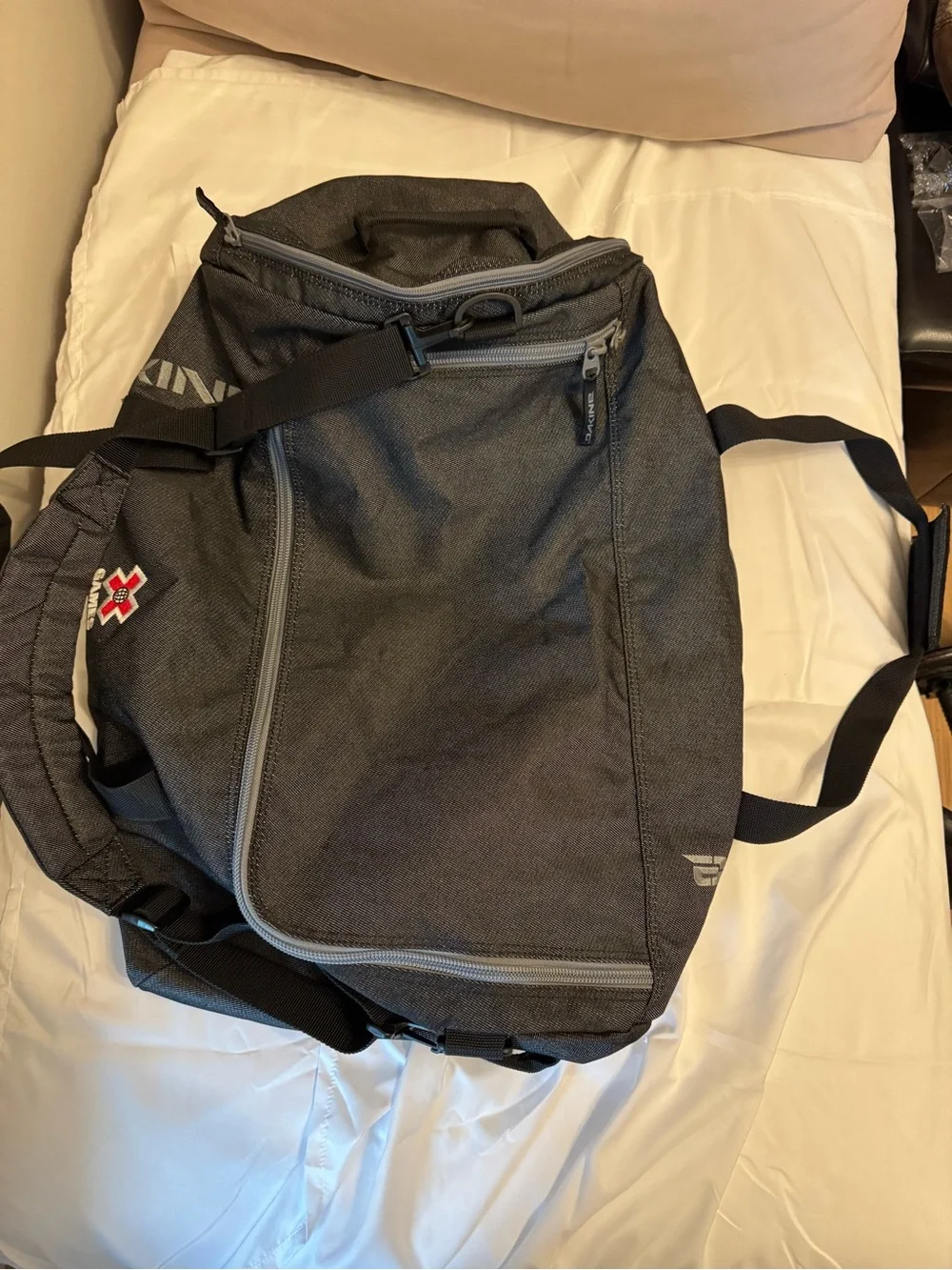 Dakine Black Duffel Bag with X Games Patch